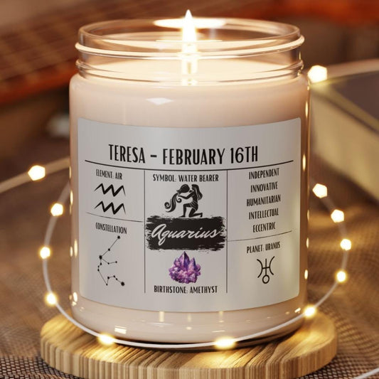 A personalized Aquarius zodiac candle with a clear lid, natural wax color, and printed label featuring the Aquarius constellation and birth information.